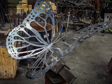 Rail Road Spike Butterflies Plasma cut wings (design by TBS and cut by 2K Metal) with a Rail Road spike body. These will live in Florida